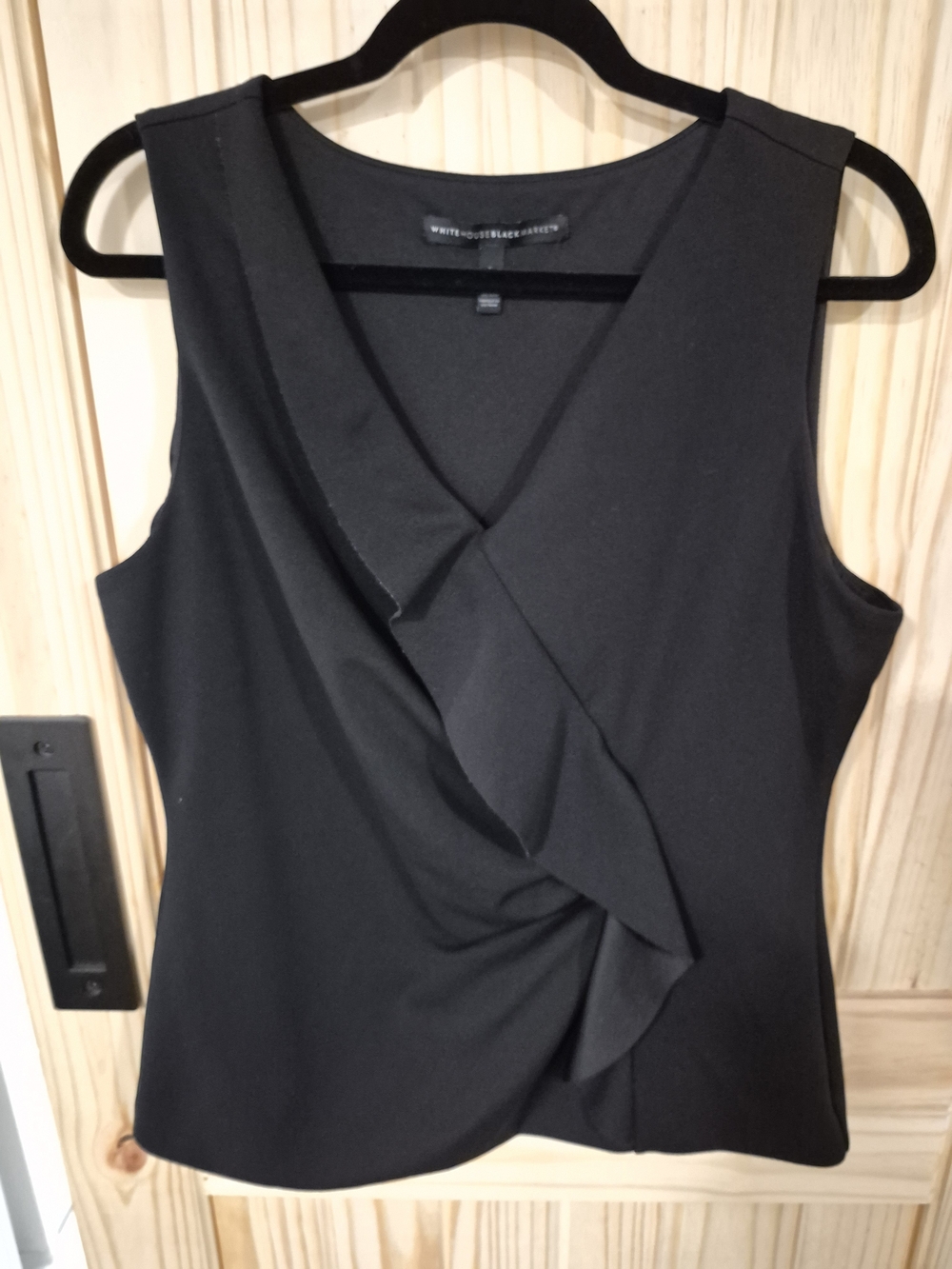 White House Black Market Black Sleeveless Ruffle Wrap Top